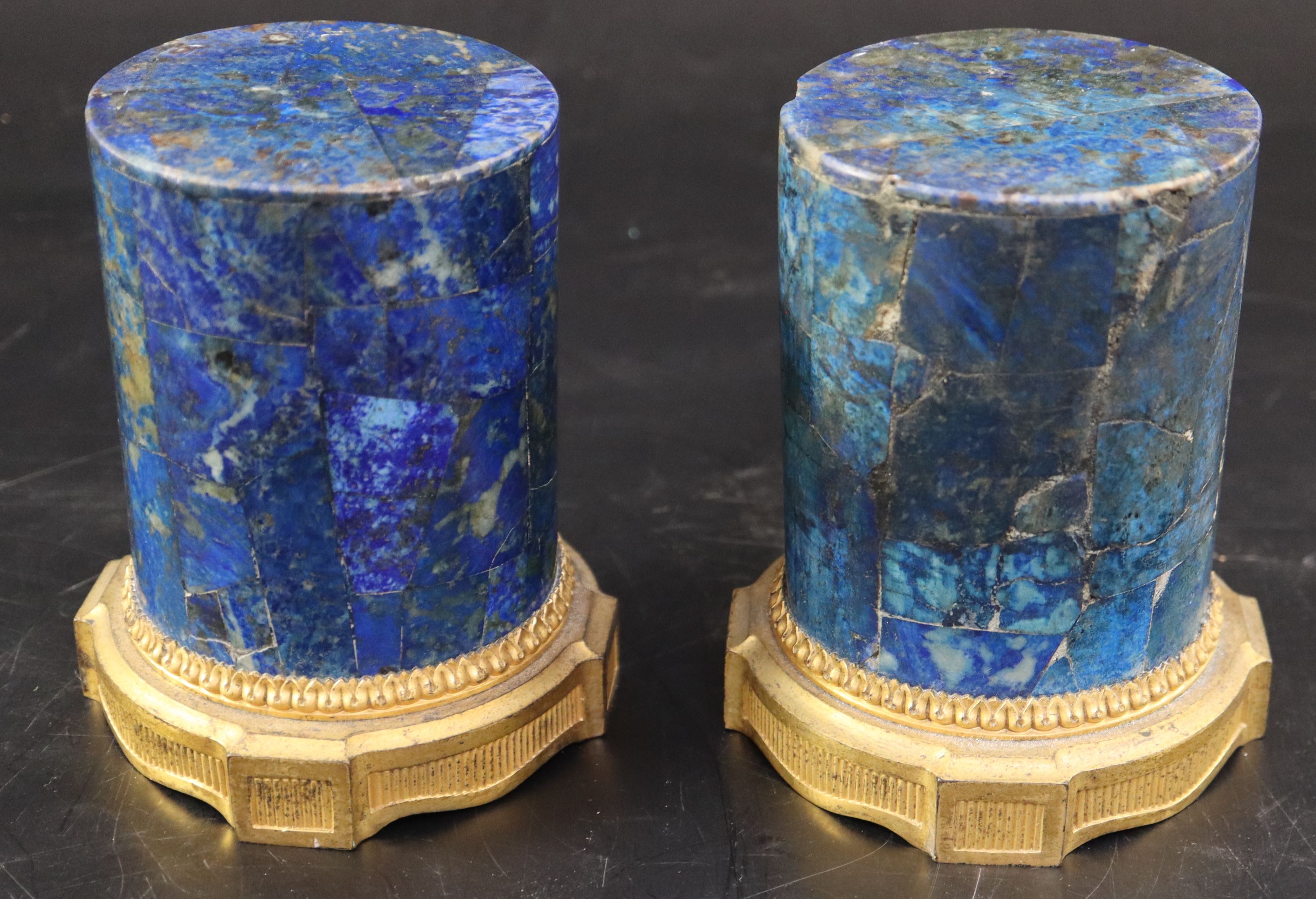 A pair of late 18th century ormolu mounted lapis lazuli socles, diameter 10cm height 12.5cm